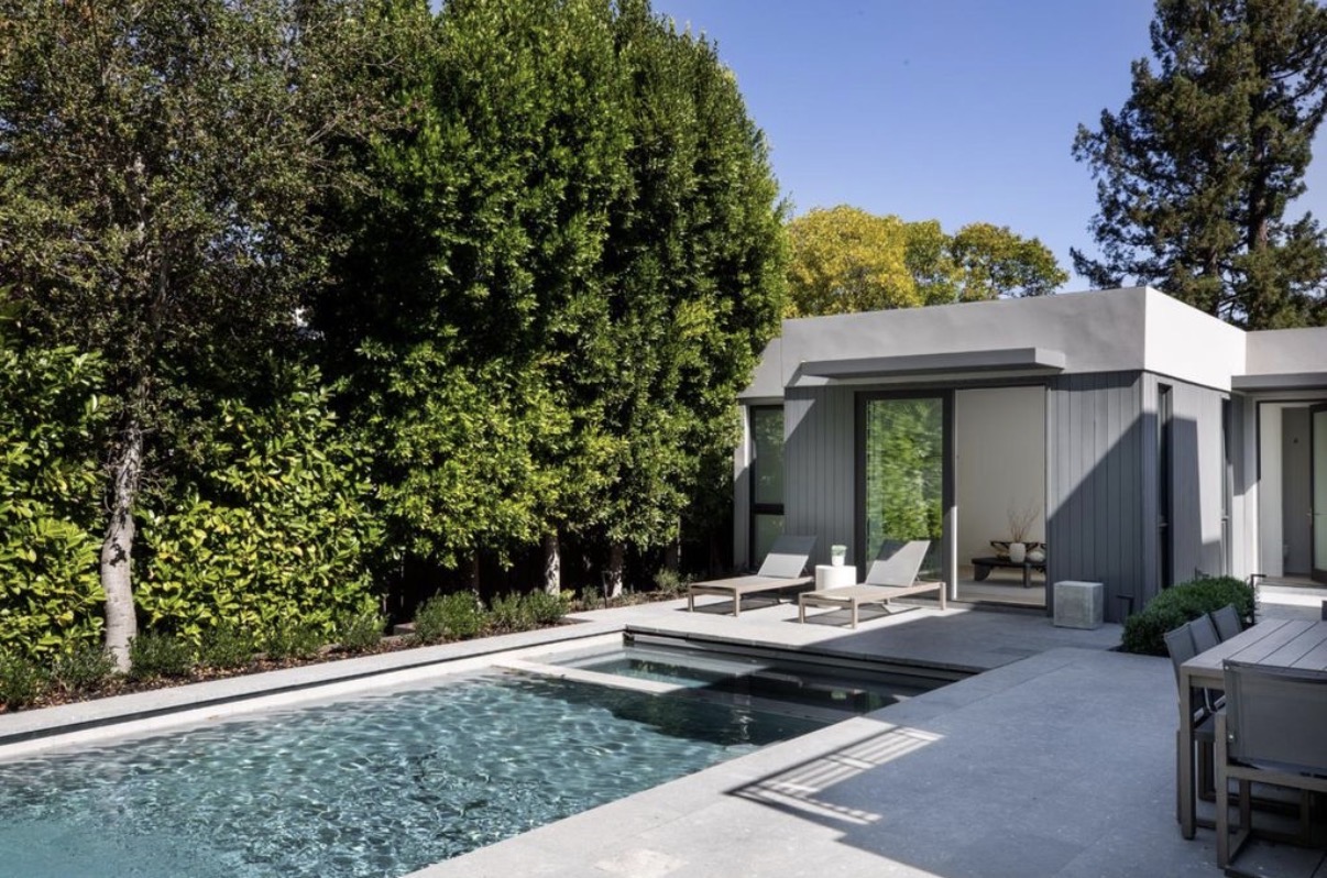 Private pool and contemporary guest house in a landscaped setting